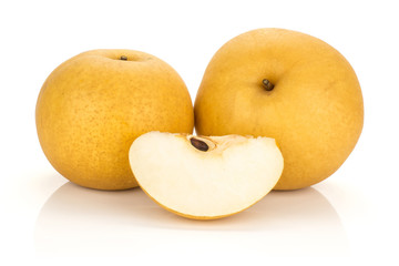 Two Chinese golden pears with one slice Nashi variety isolated on white background.
