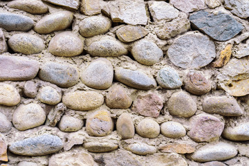 Colorful pattern of decorative brown grey  stone wall surface, background, texture, pattern