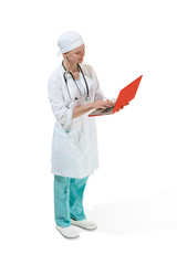 Beautiful young woman in white coat posing at studio. Full length studio shot isolated on white.