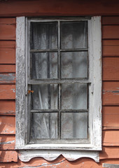 white window with orange wall