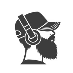 Bearded man in a cap and headphones