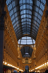 Fototapeta na wymiar Night scene of Vittorio Emanuele II Gallery in Milan, Italy
