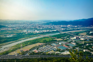 Overview cityscape city and mountation, photo shooting from the top of Mount in Taipei, Taiwan.