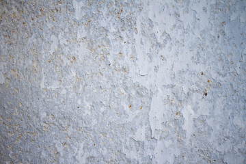Concrete wall with white, beige and blue layers background texture photos