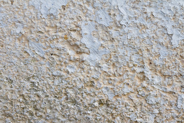 Concrete wall with white, beige and blue layers background texture photos