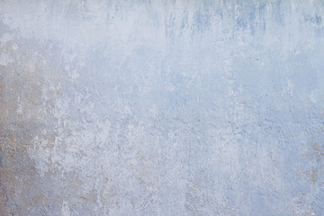 Concrete wall with white, beige and blue layers background texture photos