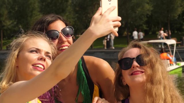 Three girlfriends make a selfie