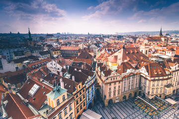 Naklejka na ściany i meble Panoramic view of Prague roofs and domes. Czech Republic. Europe. Filtered image:cross processed retro effect.