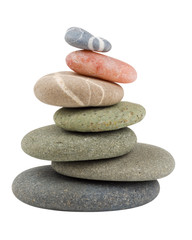 Fototapeta na wymiar Multicolored seven zen stones isolated on white 