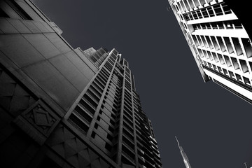 Modern business office skyscrapers, looking up at high-rise buildings in commercial district