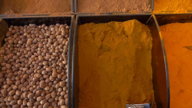 Different types of spices on a beautifully decomposed showcase in the vegetable market
