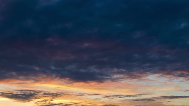 Beautiful clouds at sunset, time-lapse 4K.