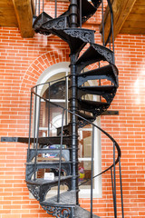 old spiral staircase made of cast iron in the water tower © miklyxa
