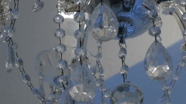 beautiful crystal chandelier wobbles