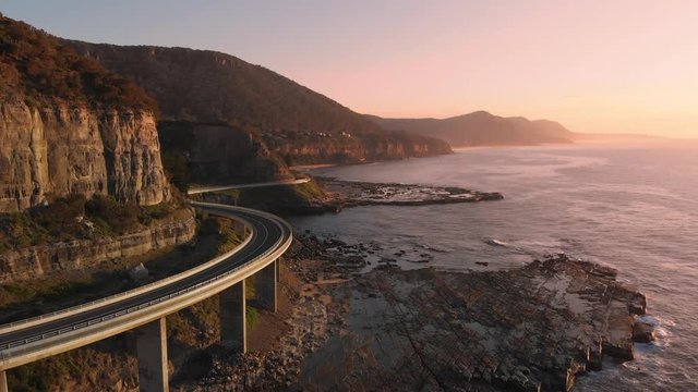 Australia aerial footage NSW sunrise sea cliff bridge coastal landscape