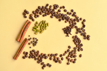 Spices are placed in a circle with a place under the text on a soft yellow background