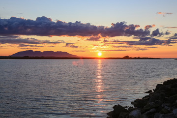 Fototapeta premium Sunset by the seaside and Vega island in Northern Norway
