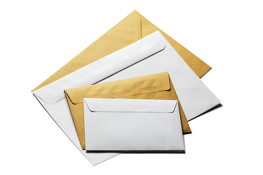 four envelopes in white and kraft paper on isolated white background with shadows