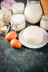 Healthy food concept. Set of dairy products dark blue background copy space