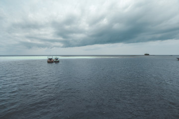 Fototapeta na wymiar Traditional Fishing Boat at Tropical Sea