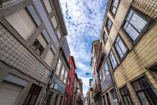 Residential buildings with tiled facades on Rua do Pinheiro in Porto, Portugal