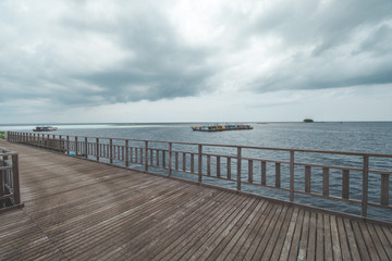 Wooden Pier at Tropical Beach