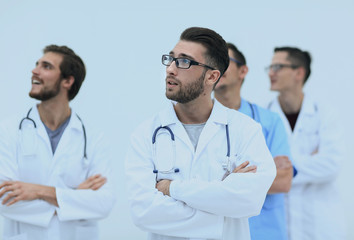 confident medical team looking at copy space