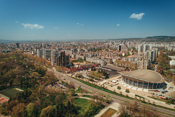 Varna. Bulgaria. 23 April 2018: Palace of Culture and Sports in Varna. Bulgaria. Aerial view over popular landmarks and sea garden - obrazy, fototapety, plakaty