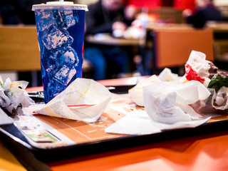 Naklejka na ściany i meble waste of food in the fast food restaurant