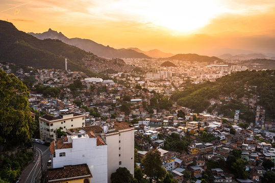 Aerial View of Rio de Janeiro Poor Areas and Slums on Hills by Sunset
