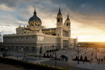 Obraz na płótnie Canvas Madrid. Image of Madrid skyline with Santa Maria la Real de La Almudena Cathedral and the Royal Palace during sunset..