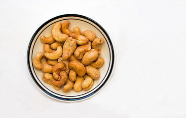 Bowl of Cashews on a White Background