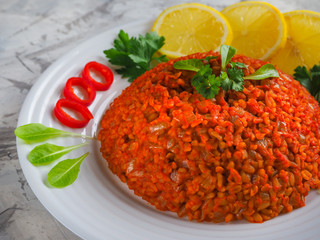  An ancient Lebanese dish with bulgur, tomatoes and onions.
