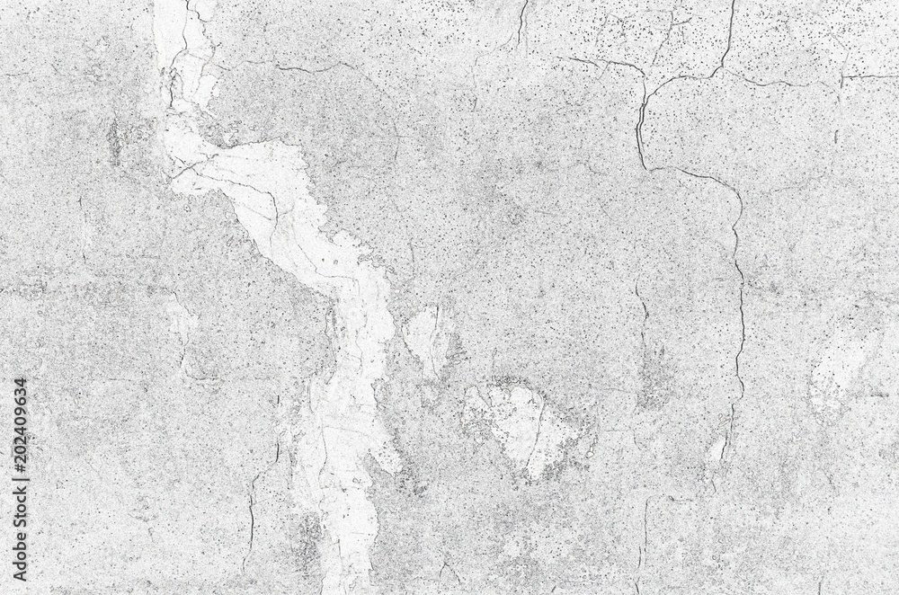 Poster background consisting of a cracked concrete wall in computer processing.