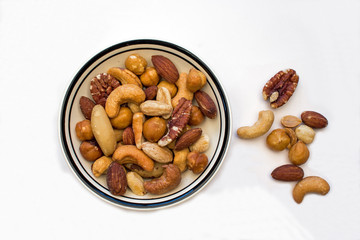 Bowl of Mixed Nuts on a White Background