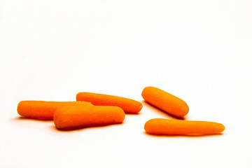 Orange Baby Carrots on a white background