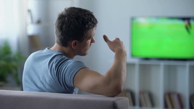 Man upset by poor quality digital television, delay of football match broadcast