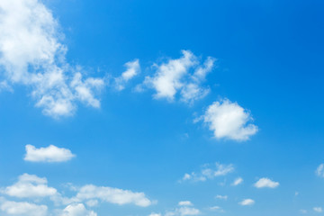 Naklejka na ściany i meble blue sky background with white clouds.