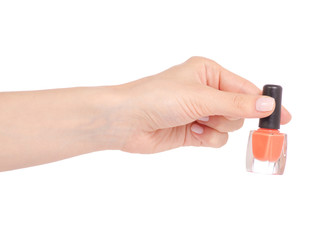 Orange nail polish in hand