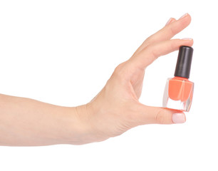 Orange nail polish in hand