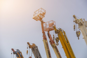 Many crane lift or mobile on construction industrial