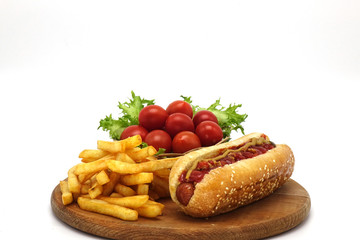 Hot dogs and French fries on white background.