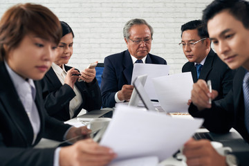 Lawyers working with papers