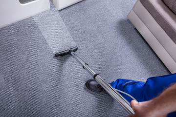 Janitor Cleaning Carpet