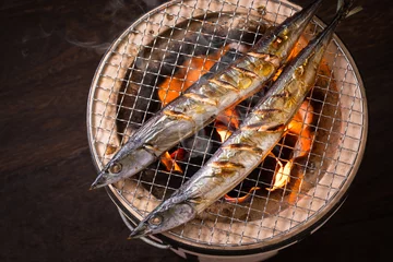 Fotobehang 秋刀魚を焼く © BRAD