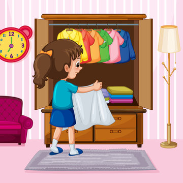 A Girl Folding Cloth in Wardrobe