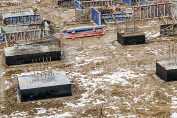  Construction pit with building materials, beginning of construction of a house
