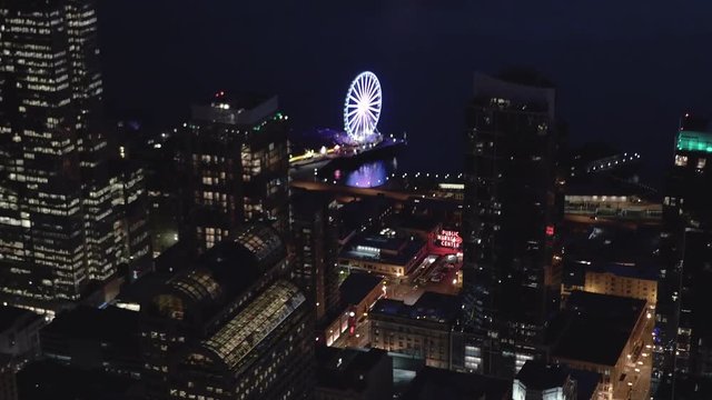 Helicopter Filming Seattle Waterfront Streets at Night