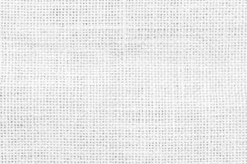 Jute hessian white sackcloth woven burlap texture pattern background in old aged light grey color