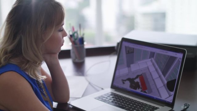 Woman Working As Architect Doing 3D Render On Computer